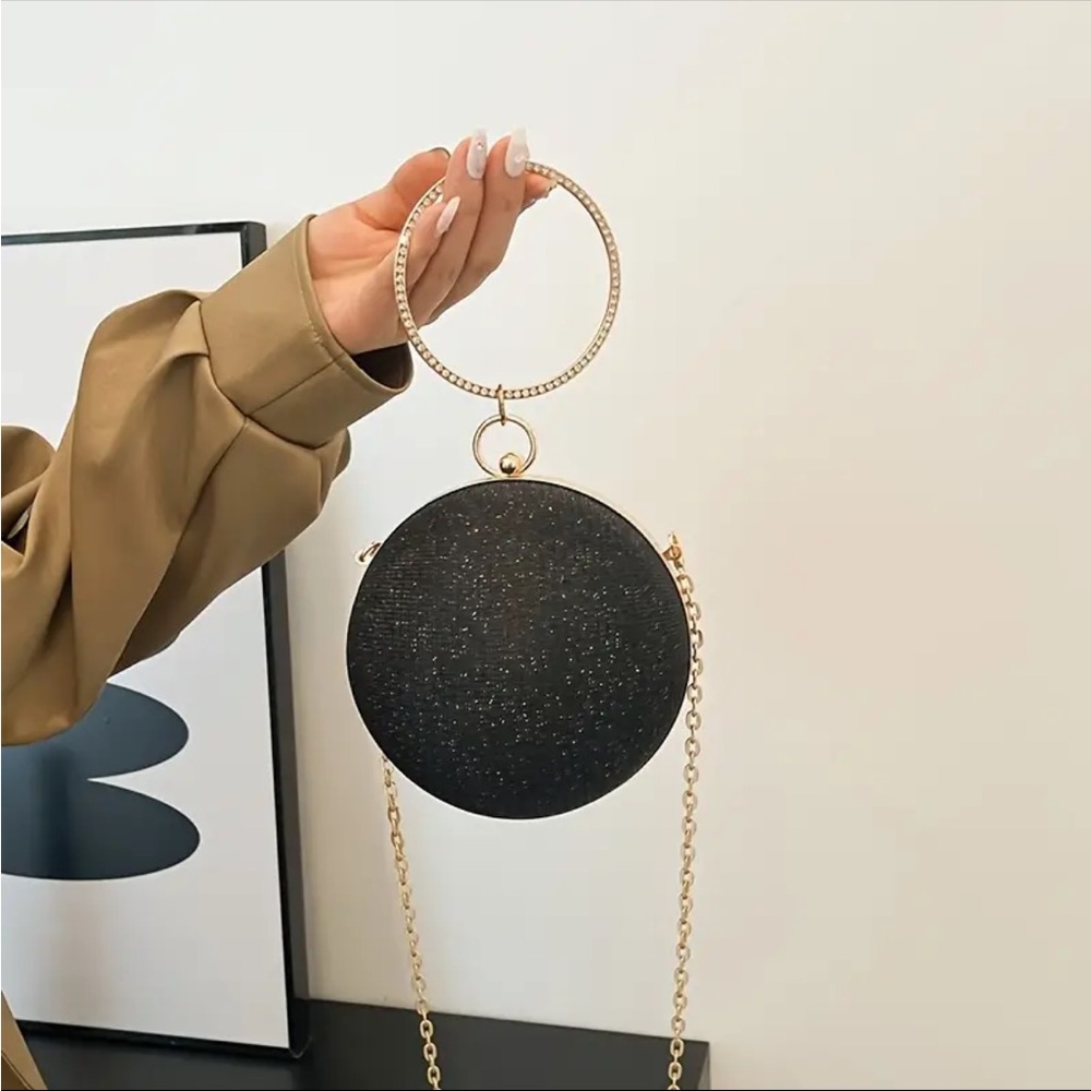 Elegant Black and Gold Women's Spherical Bag